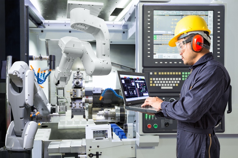 Engineer,Using,Laptop,Computer,For,Maintenance,Automatic,Robotic,Industrial,With
